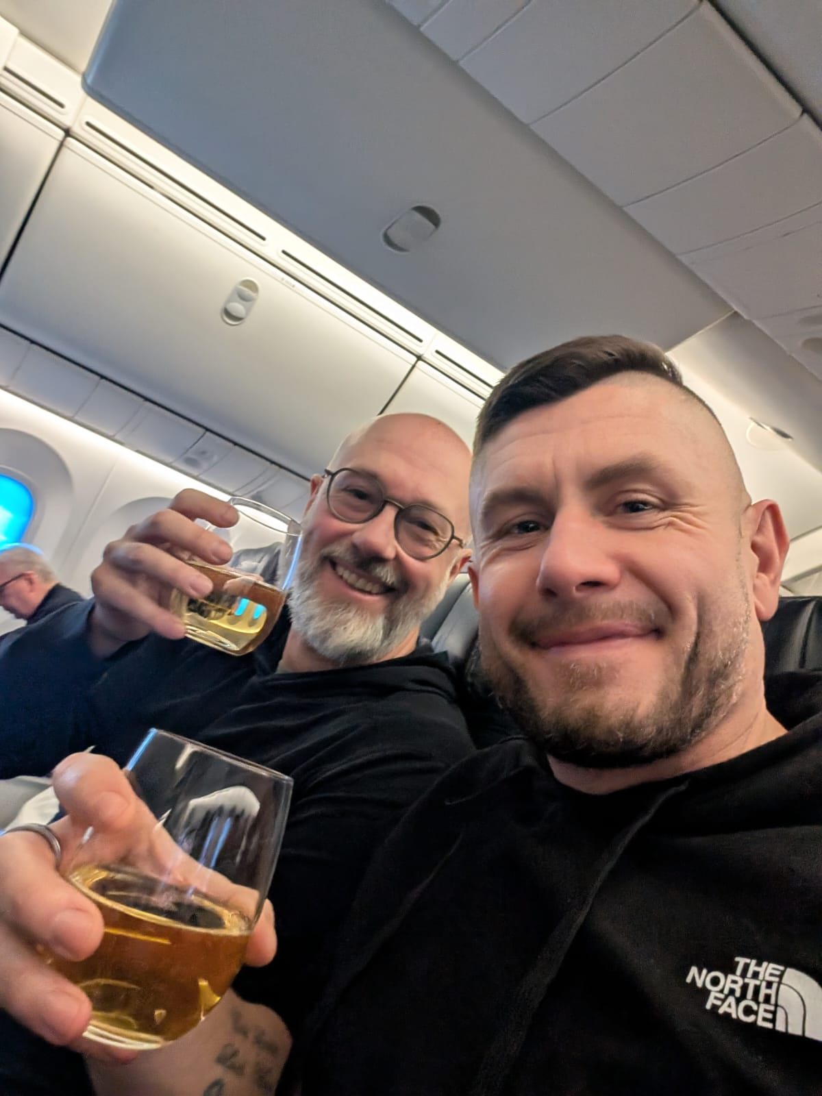 Mike and Rob on the flight to Canada, February 2026
